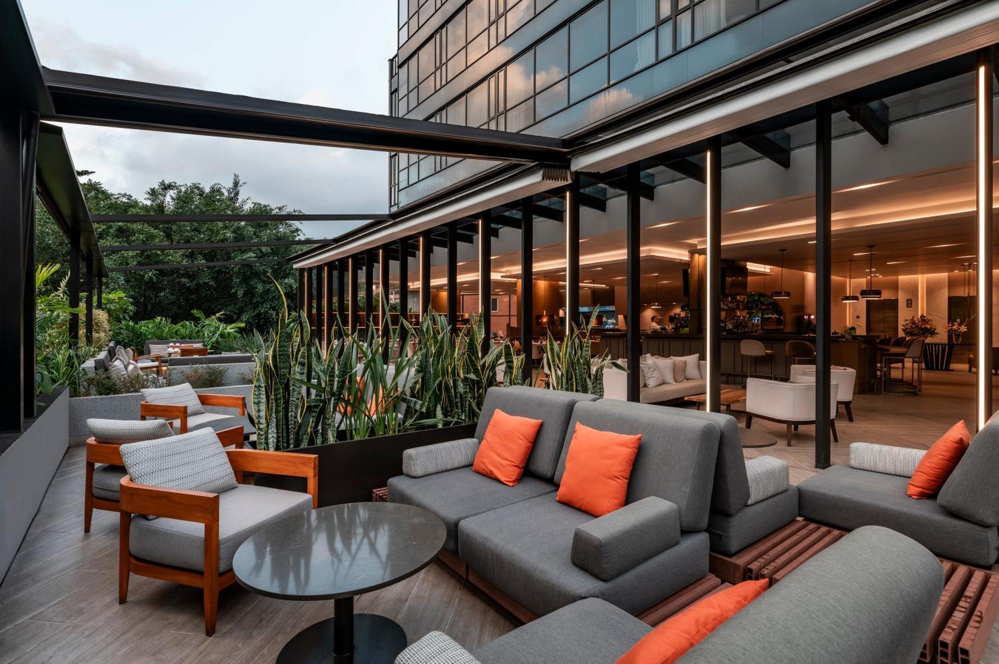Hotel York Luxury Suites Medellin By Preferred Экстерьер фото The hotel's rooftop lounge